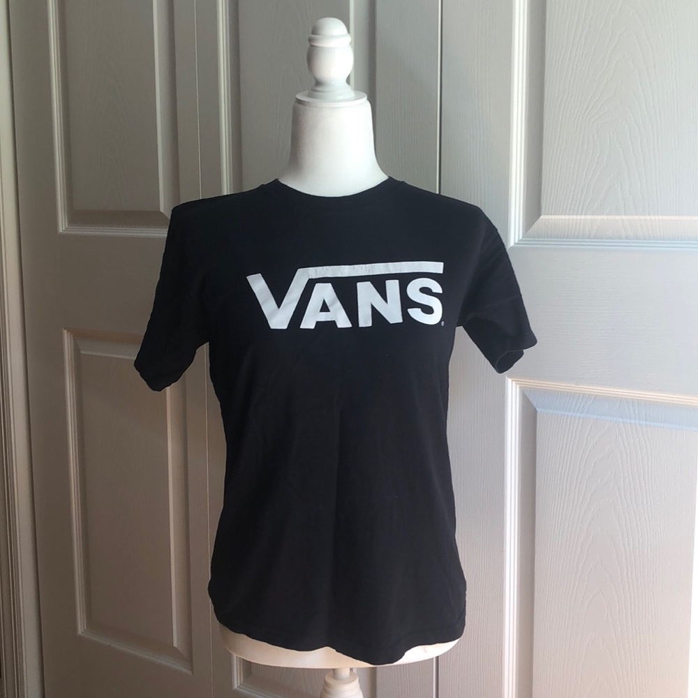 Black Vans tee shirt.